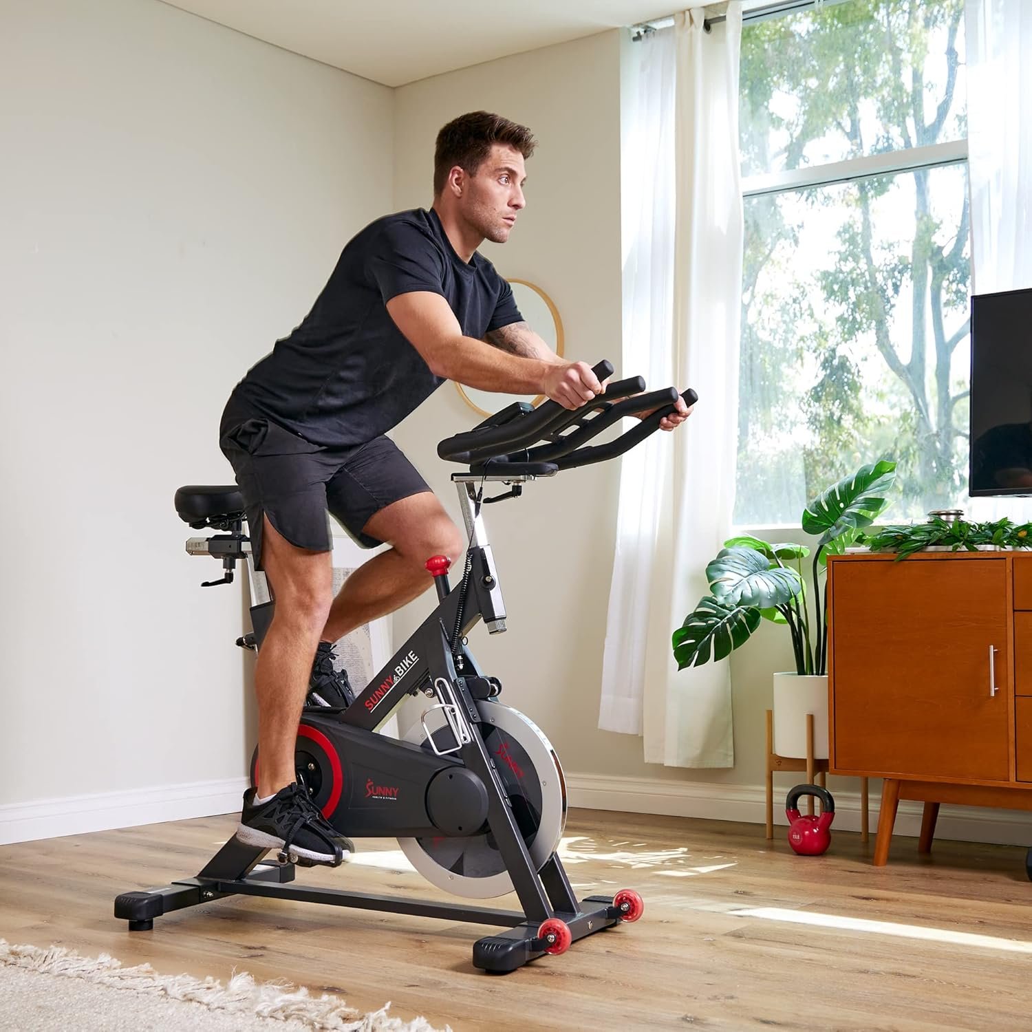 Sunny Health & Fitness Magnetic Exercise Bike, 44LB Flywheel & 300LB Weight Capacity for Intensive Home Workout, Indoor Cardio Training w/4-Way Adjustable Seat, Optional Free SunnyFit App Connection - Image 9